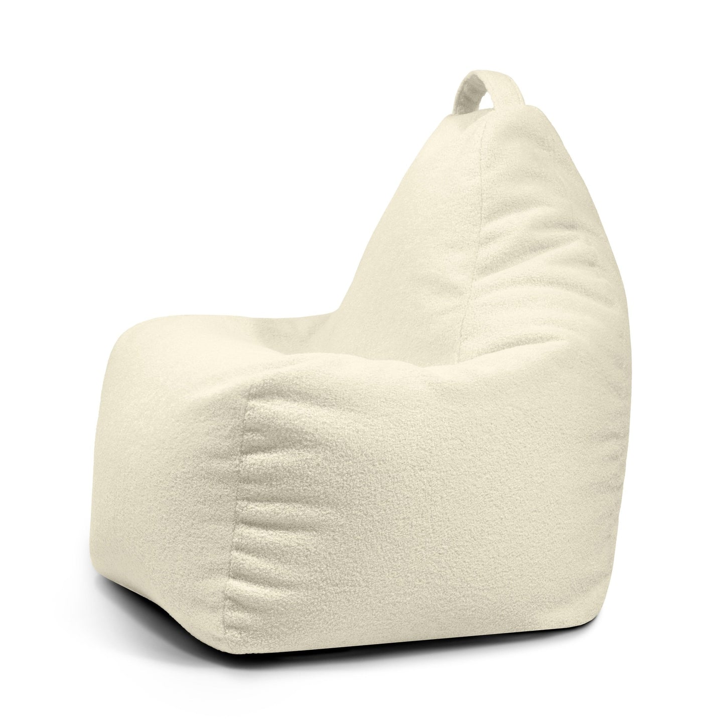 El Bean bag Play Teddy, en color crema con respaldo y asa superior, se muestra inclinado de lado sobre un fondo blanco: un puff moderno ideal para cualquier espacio.