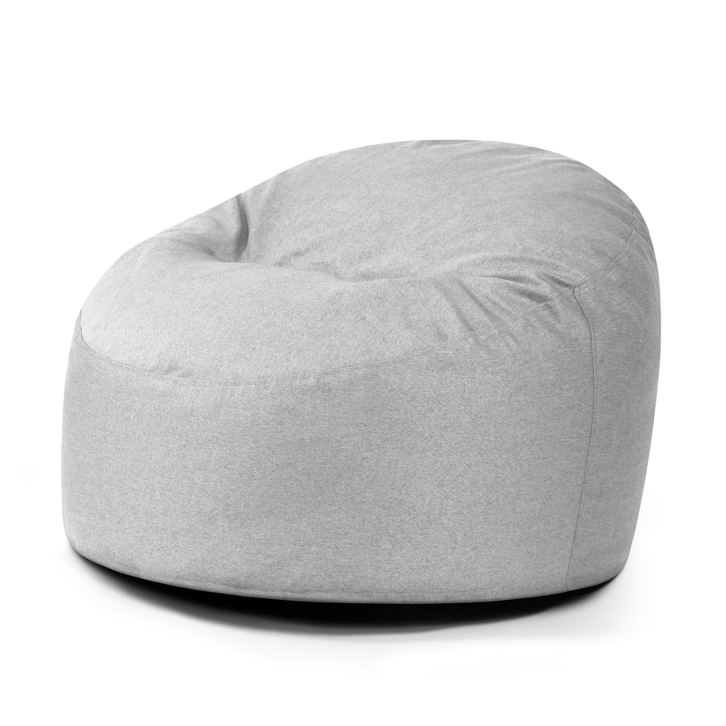 El Puff redondo de espuma y tejido nórdico 85×85×38 cm - OM 85 NORDIC, ideal para salón o dormitorio, presenta una forma redonda y una suave funda de tejido nórdico, que se muestra sobre un fondo blanco liso.