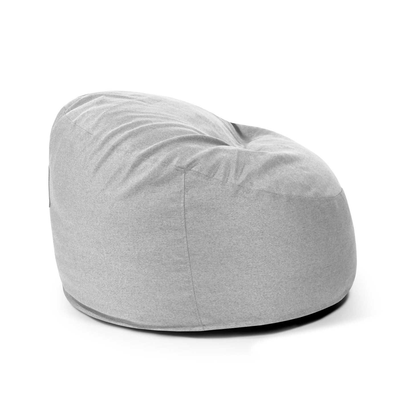 Un OM 85 NORDIC puff redondo de espuma y tejido nórdico (85×85×38 cm) de color gris claro, con forma redonda y ligeramente aplastada, ideal para salón o dormitorio, que se muestra sobre un fondo blanco liso.
