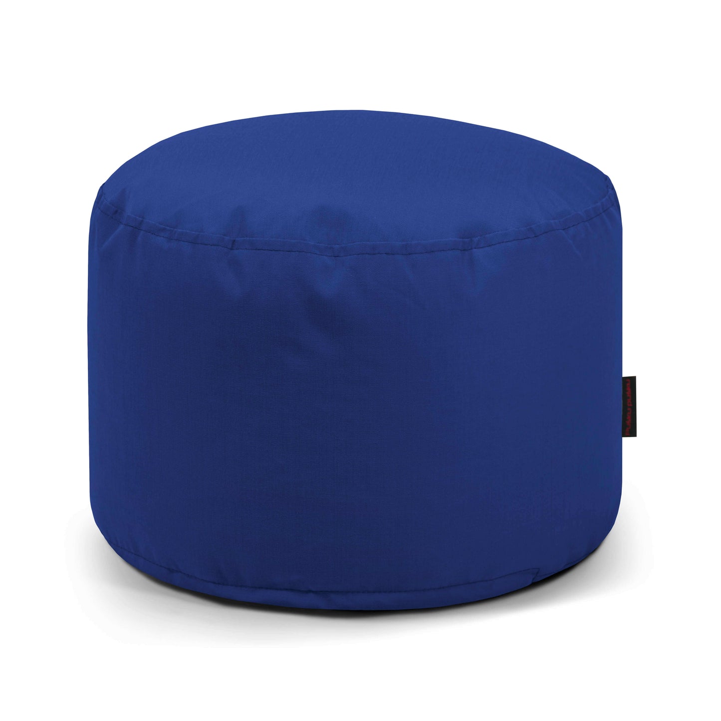 El Pouf Mini Colorin - uso exteriores es un puf redondo de color azul con laterales lisos y etiqueta en el lado derecho, fabricado en tela certificada OEKO-TEX. Ofrece un asiento compacto y versátil y se presenta sobre fondo blanco.