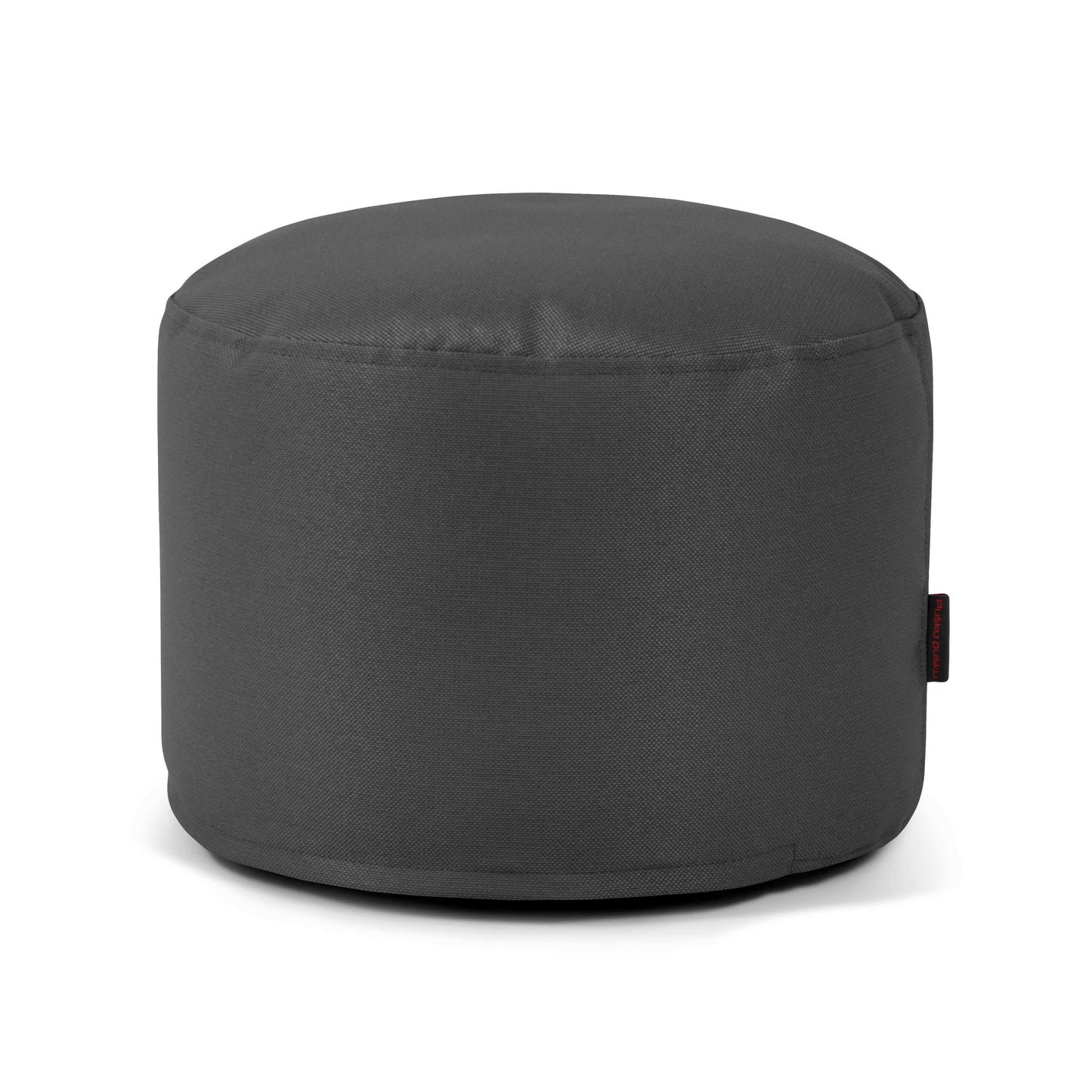 El Puff redondo de tejido ignífugo 40×40×30 cm MINI PROFUSE, en gris oscuro con etiqueta lateral y superficie lisa, sirve como asiento compacto y aparece sobre un fondo blanco.