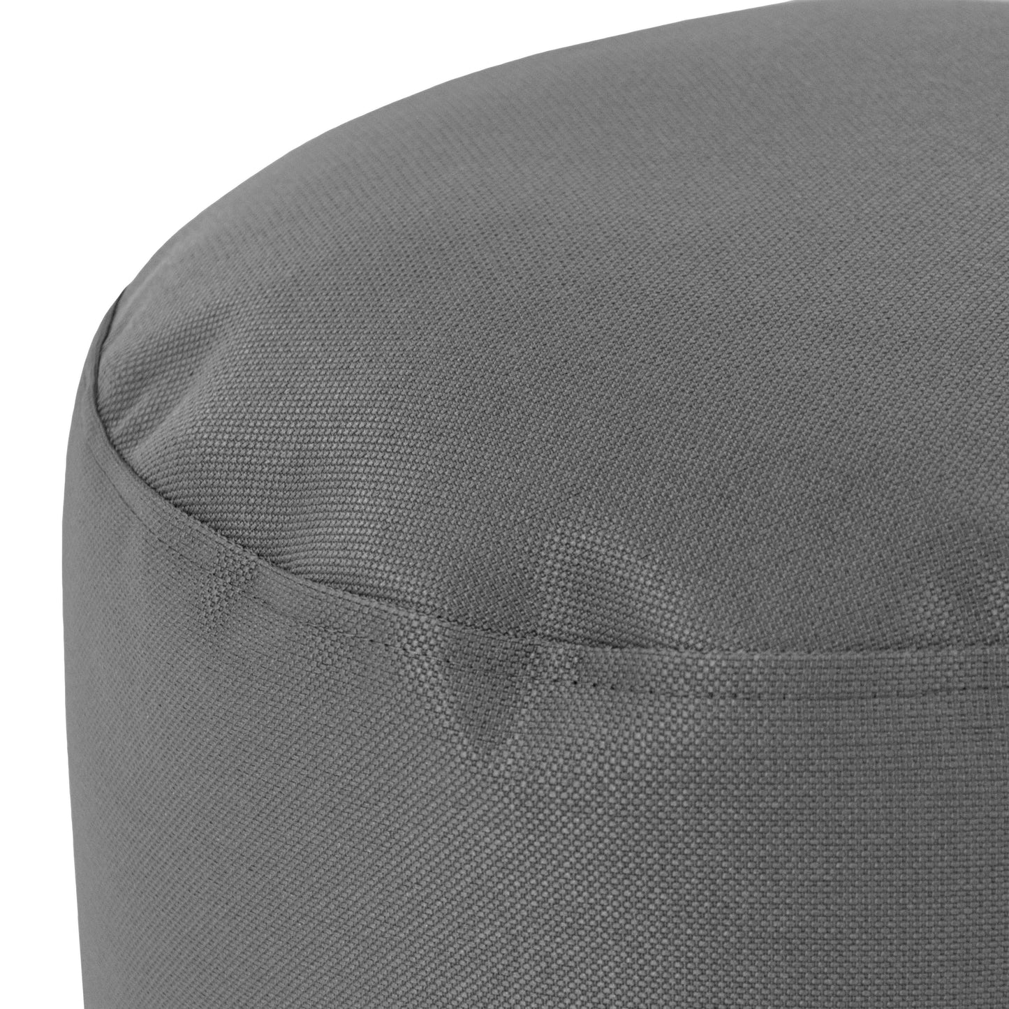 Primer plano del borde superior del Puff redondo de tejido ignífugo 40×40×30 cm MINI PROFUSE, compacto para dormitorio o salón, mostrando detalles visibles de costuras.