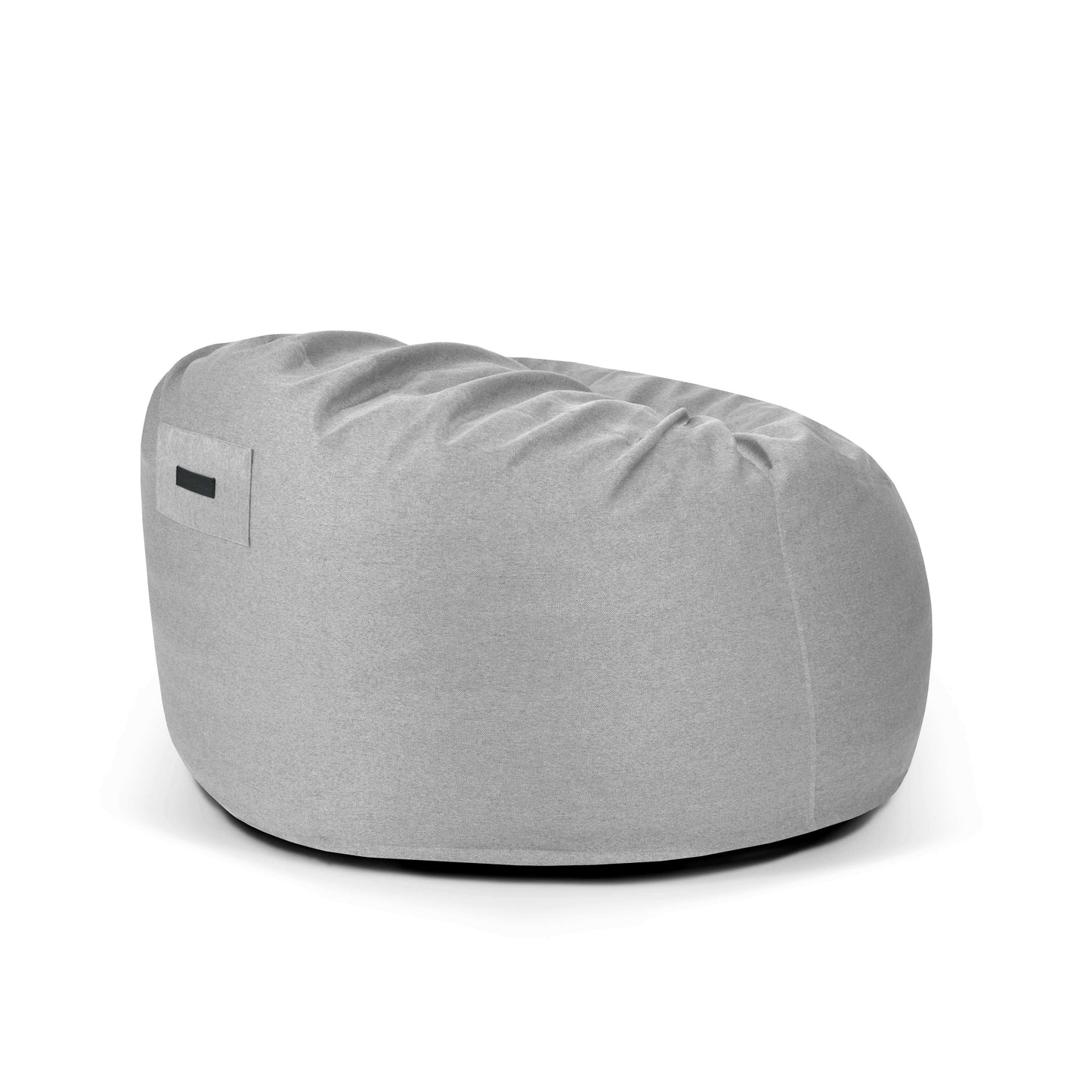 La Foam Bean Bag OM 110 Barcelona es una moderna silla ergonómica de color gris claro con asa lateral, perfecta para cualquier espacio, mostrada sobre fondo blanco.