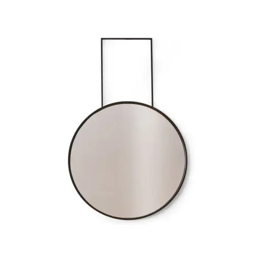 Espejo One Eyed de pared circular con un diseño moderno y elemento para colgar.